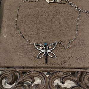 Elegant Silver Butterfly Necklace with Teal Gem